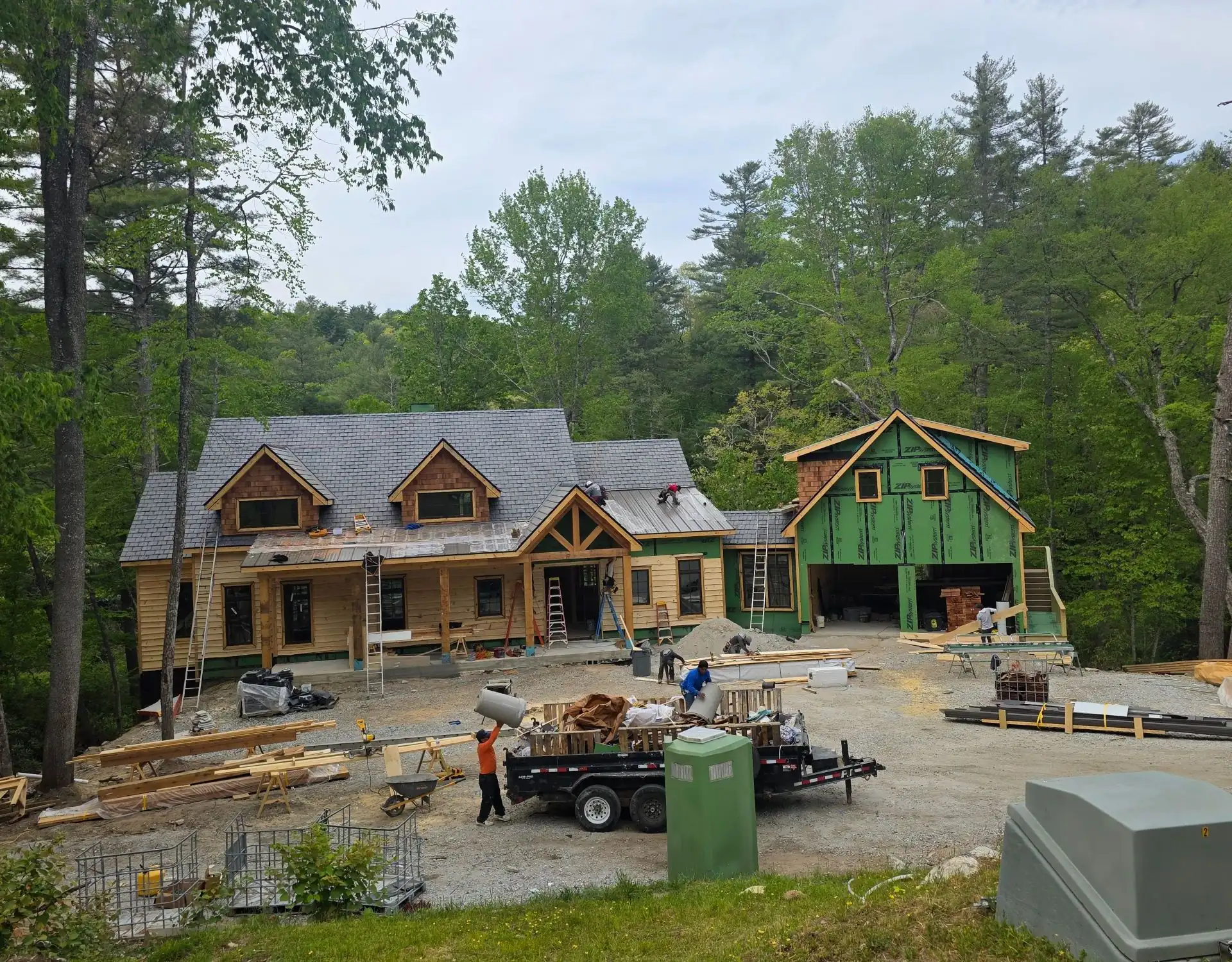 Bird Carpenter crew framing and drying in a new home
